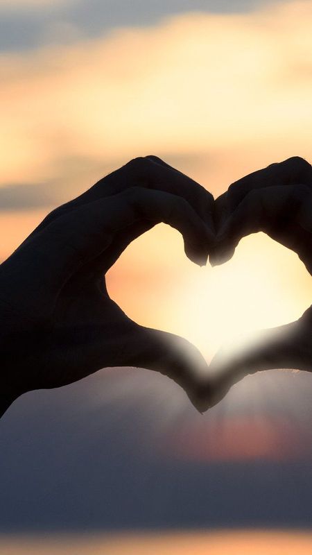 Heart shape with Hand Wallpaper